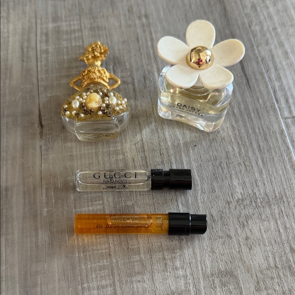 Set of three perfume samples and a vintage perfume bottle